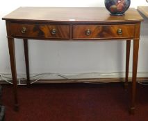 A reproduction mahogany two drawer side table, width 90cm.