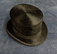 A top hat, marked JJ Petet, Paris, head size 20cm x 16cm.