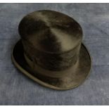 A top hat, marked JJ Petet, Paris, head size 20cm x 16cm.