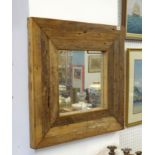 A rustic pine framed mirror together with a gilt framed mirror with landscape decoration 61cm x 88cm