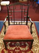 A Chinese Chippendale style elbow chair together with three other chairs (4).