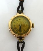 A vintage ladies 9ct gold cased wristwatch with Swiss movement.