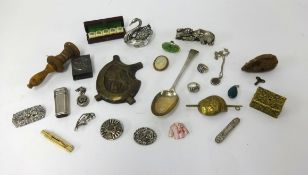 A collection of various interesting objects, including Charles Maine Jersey silver spoon, costume