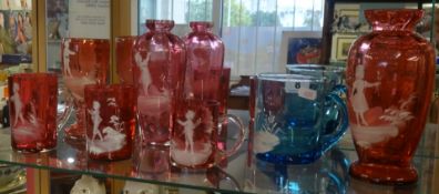 A collection of Mary Gregory style Victorian coloured glassware (6).