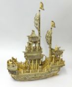 A Chinese carved bone pleasure boat, height 60cm, length 46cm.