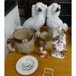A pair of Staffordshire Spaniel dogs and three other Staffordshire items, a 19th Century