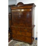 An 18th century walnut escritoire, the upper section with moulded cornice above a