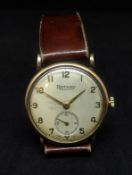 A vintage gents gold cased Rotary wristwatch with arabic numerals, sub-second dial, circa 1950's.