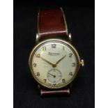 A vintage gents gold cased Rotary wristwatch with arabic numerals, sub-second dial, circa 1950's.