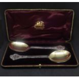 A pair of Edward VII Scottish silver spoons, Hamilton and Inches, Edinburgh 1910, with lace back