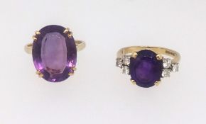 Two 18ct amethyst set dress rings (one set with six diamonds) finger size M approx. 10.2gms.