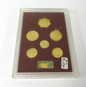 A cased Franklin Mint 'The Royal Silver Wedding Coins 1972' six coin set, of 22ct gold plated