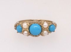 A 9ct turquoise and pearl seven stone ring, finger size N.