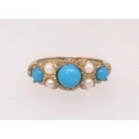 A 9ct turquoise and pearl seven stone ring, finger size N.