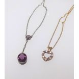 A 9ct gold heart pendant necklace and another necklace (2)