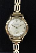 Rolex, a vintage ladies 9ct gold Rolex watch with a 9ct gold bracelet, the dial marked 'Precision'