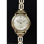 Rolex, a vintage ladies 9ct gold Rolex watch with a 9ct gold bracelet, the dial marked 'Precision'