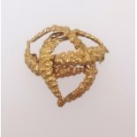 A 18ct yellow gold stylish brooch, approx 12.4gms.