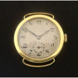 An 18ct vintage gents wristwatch, the dial with arabic numerals and subsidiary seconds (no strap).