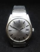 Omega, a gents stainless steel automatic Geneva calendar watch, with original box and booklet, model