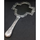 A Victorian silver hand mirror with pierce and chased design, length 32cm.