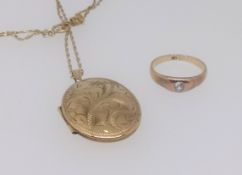 A antique 18ct ring set with an old cut diamond, finger size N, together with a 9ct gold locket