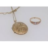 A antique 18ct ring set with an old cut diamond, finger size N, together with a 9ct gold locket