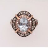 An impressive 14ct aquamarine and diamond cluster ring of rose colour, finger size N.