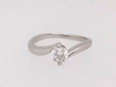 A platinum and diamond single stone ring with original purchase receipt 2013 for £1,650, finger size