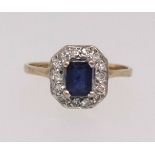 A 9ct diamond and sapphire cluster ring (AT Ltd), finger size M.