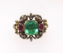 An antique emerald and ruby three stone ring the emerald approx. 1.80ct, finger size S.