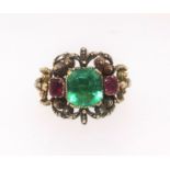 An antique emerald and ruby three stone ring the emerald approx. 1.80ct, finger size S.