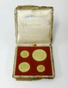 A set of four Sir Winston Churchill commemorative medals set in 18ct gold, by Metal Import Ltd