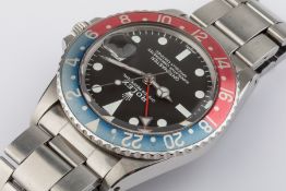 Rolex, GMT Master 1675, a 1969 gents wristwatch, pepsi dial, case no.1937819 with another