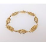 A 18ct gold modern panel bracelet, length 19cm, approx 14.9gms,