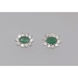 A pair of emerald and diamond effect cluster earrings.