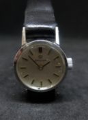 Omega, a ladies stainless steel vintage wristwatch, automatic, the dial with gilt batons.