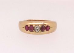 An 18ct ruby and diamond ring, purchased in 1989 at Bowden's of Plymouth with receipts, finger