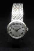 Jaeger LeCoultre, a ladies 9ct white gold bracelet watch, model 91818, with purchase receipt dated