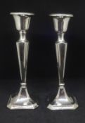 A pair of silver candlesticks, height 20cm.