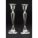 A pair of silver candlesticks, height 20cm.