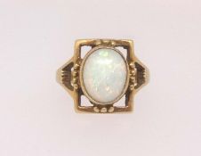 An 18ct opal set ring, finger size K.