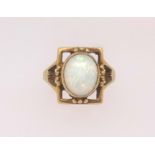 An 18ct opal set ring, finger size K.