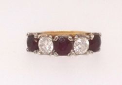 An 18ct ruby and diamond half eternity ring, set with five stones, finger size L (purchased at