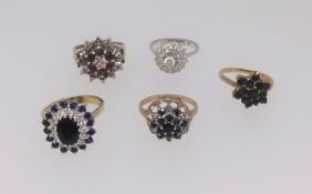 An 18ct cluster set dress ring together with four other 9ct gold dress rings (5) total weight