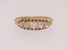 An 18ct five stone diamond ring, finger size N.