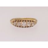 An 18ct five stone diamond ring, finger size N.