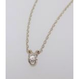A 9ct yellow gold pendant necklace with chain set with a single diamond.