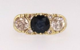 A Victorian style 18ct sapphire and diamond ring, the sapphire 5.8mm round, two diamonds approx. 0.