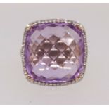 A large 9ct amethyst and diamond cluster ring (Fraser Hart), finger size T.